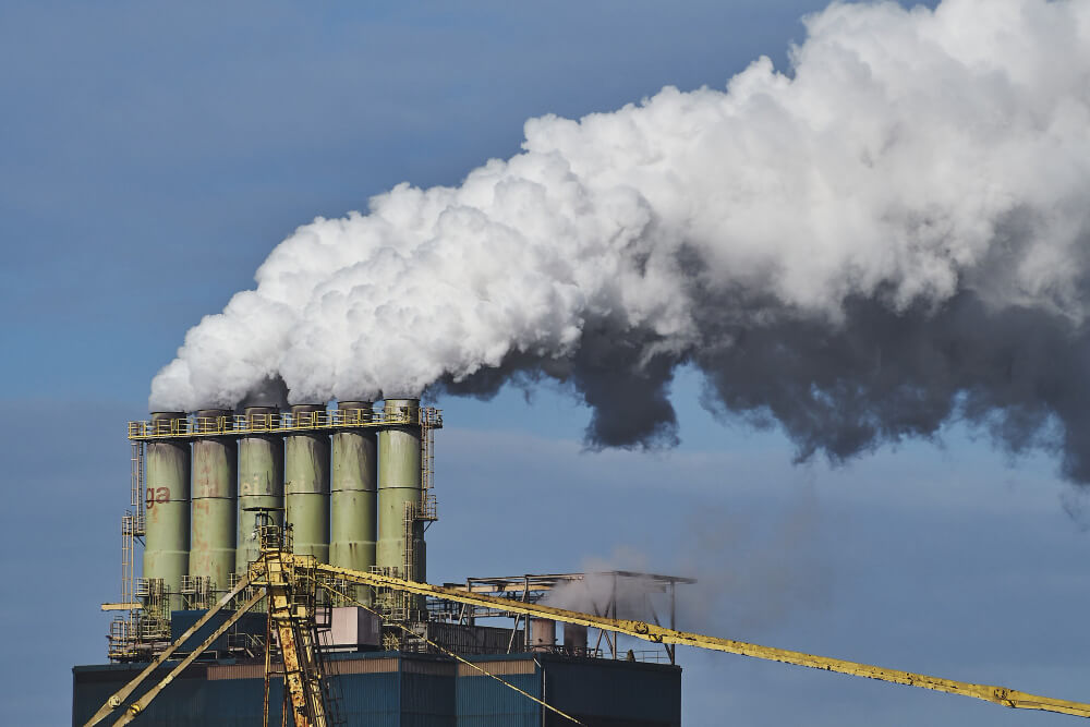 smoke coming out factories industrial area